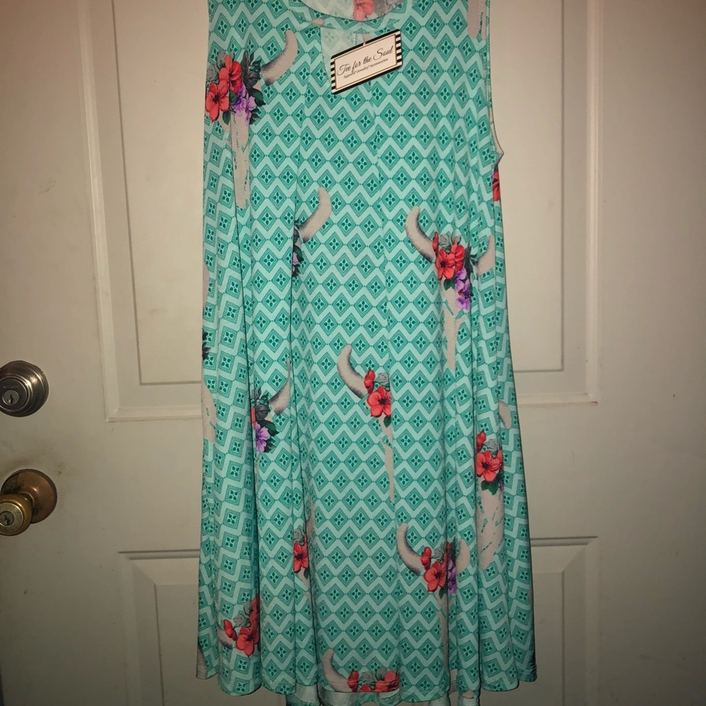 Tee for the soul swing top! Has pockets.
